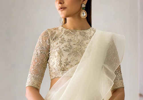 dreamy off white saree  with Embroidered Blouse: Indian Party Wear