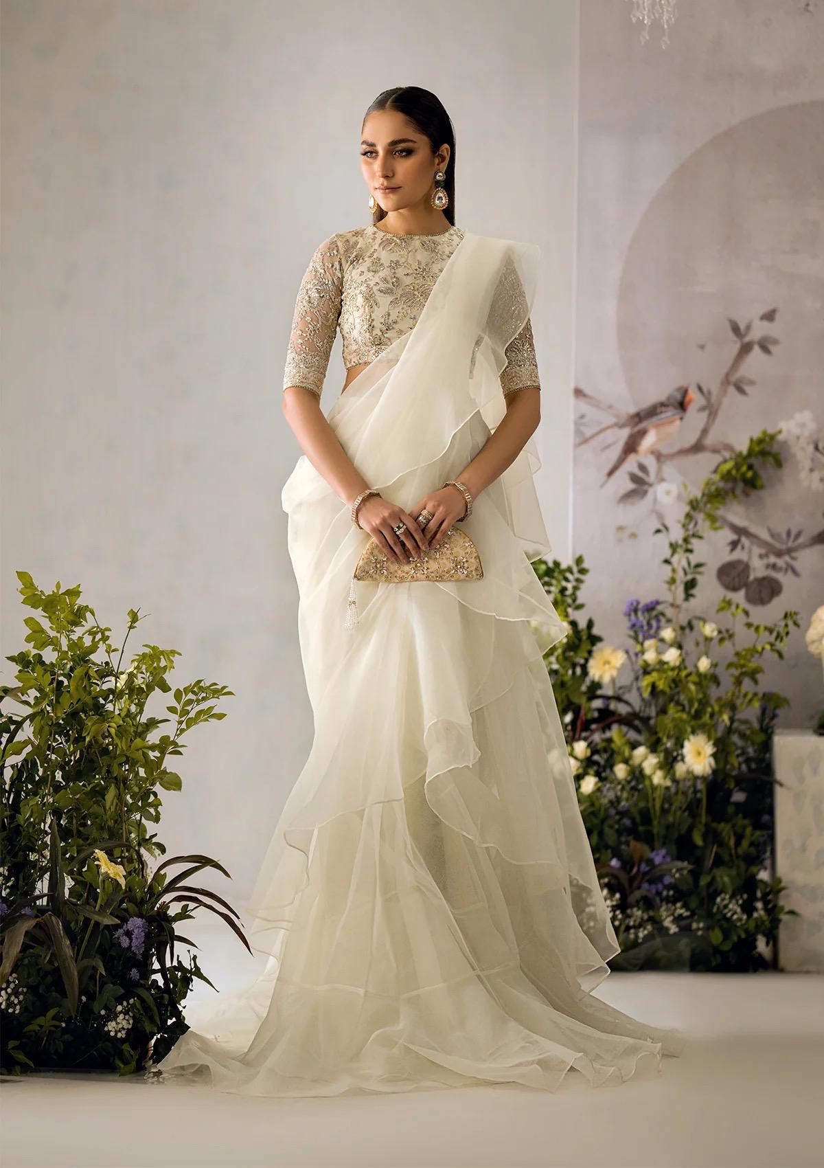 dreamy off white saree  with Embroidered Blouse: Indian Party Wear